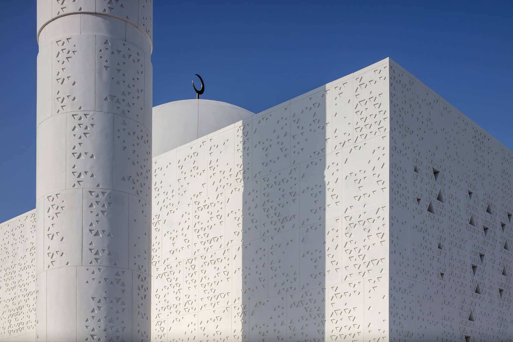Architecture Photography Dubai: Light & Shadow, a close up of Mosque of light façade, Dubai.